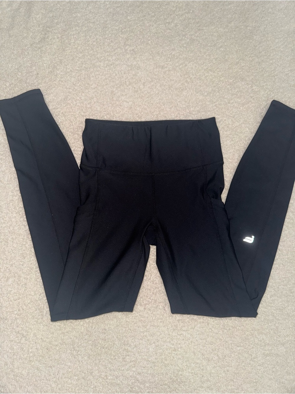 Fabletics black leggings with side pockets